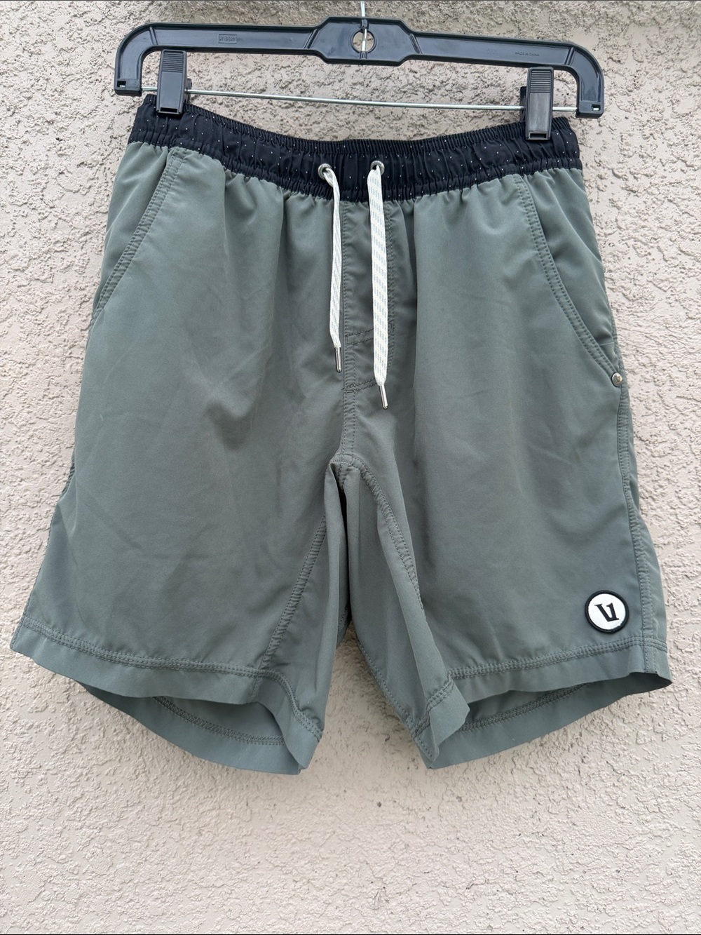 Vuori Men's Olive Green Athletic Shorts with Black Waistband and White Drawcord